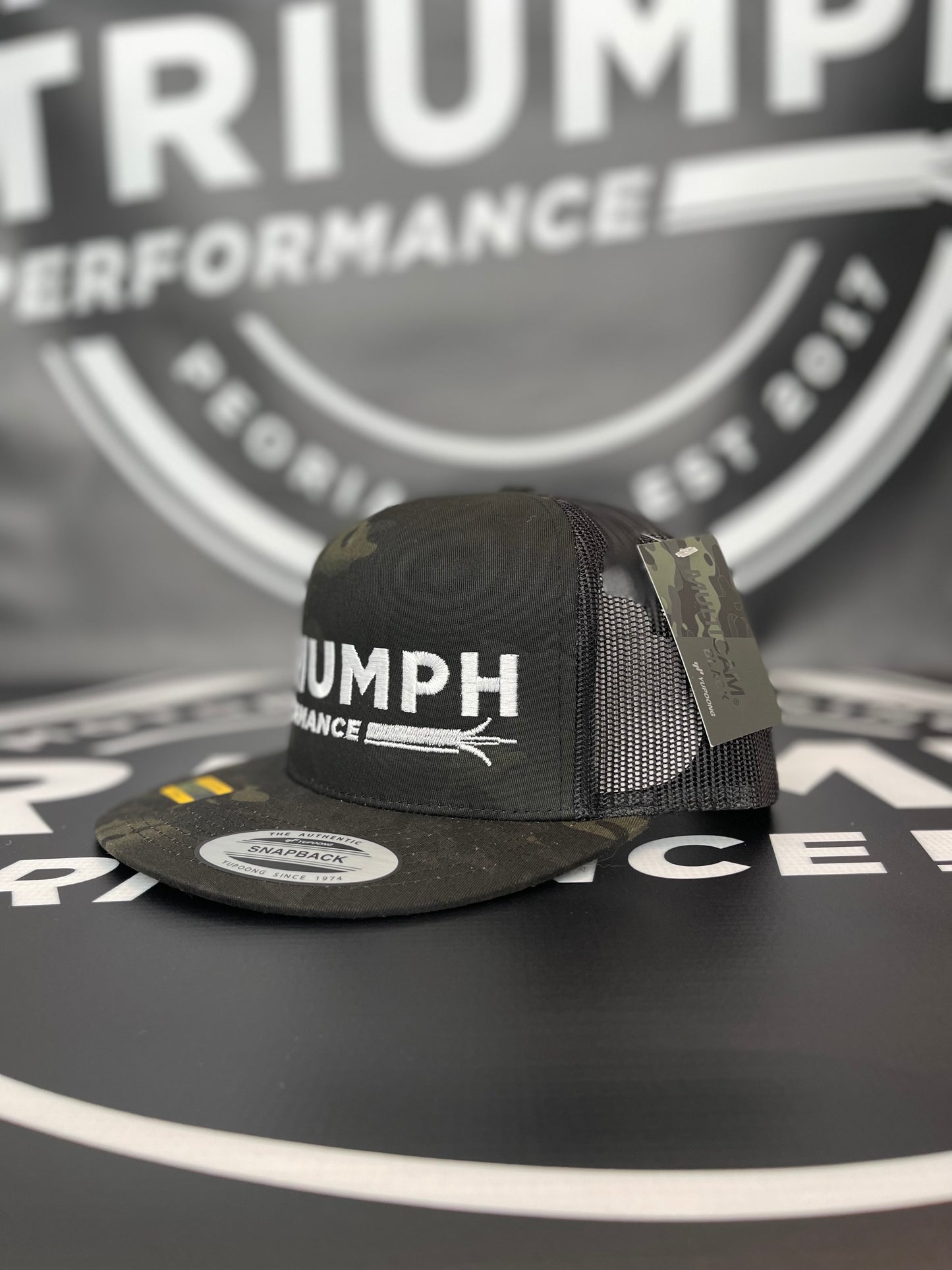 TRIUMPH PERFORMANCE BLACK "MULTICAM" MESH TRUCKER SNAPBACK